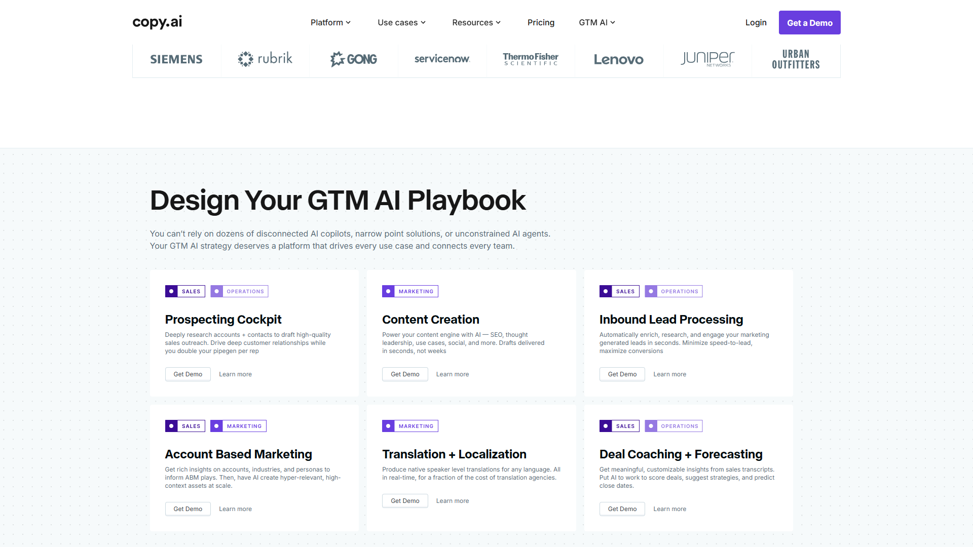Copy.ai GTM AI Playbook page with six use-case cards including Prospecting, Content Creation, and Lead Processing