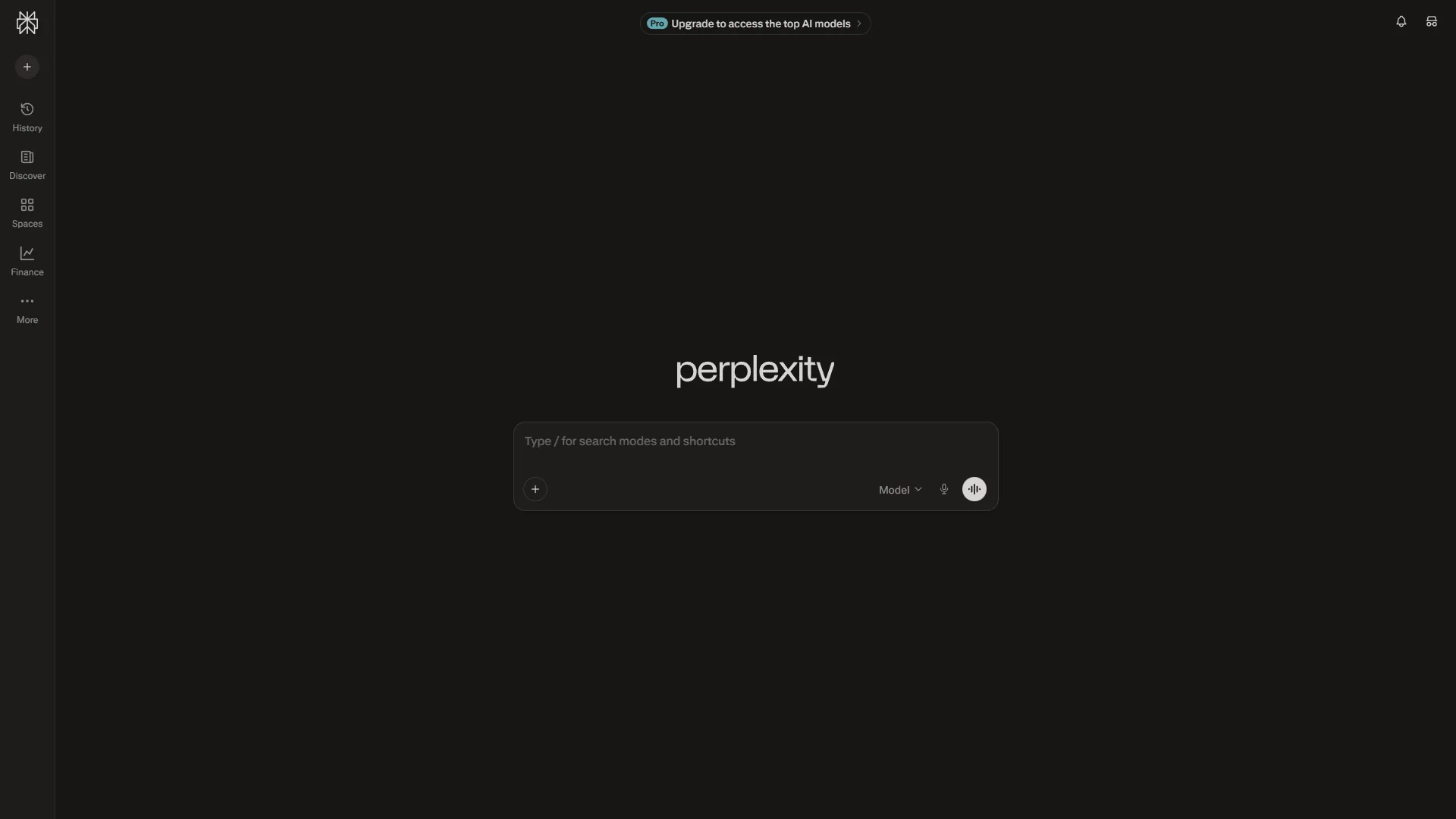Perplexity homepage with search bar, model selector, and sidebar links for History, Discover, and Spaces