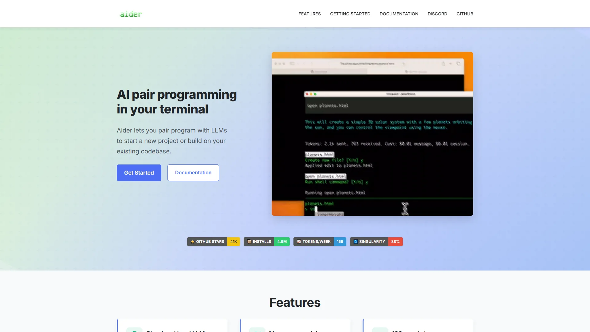 Aider running in terminal showing AI pair programming session with automatic git commits and code changes