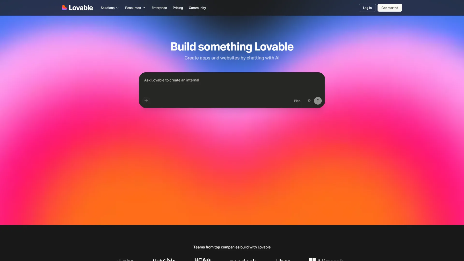 Lovable homepage with prompt input field, gradient background, and company logos below