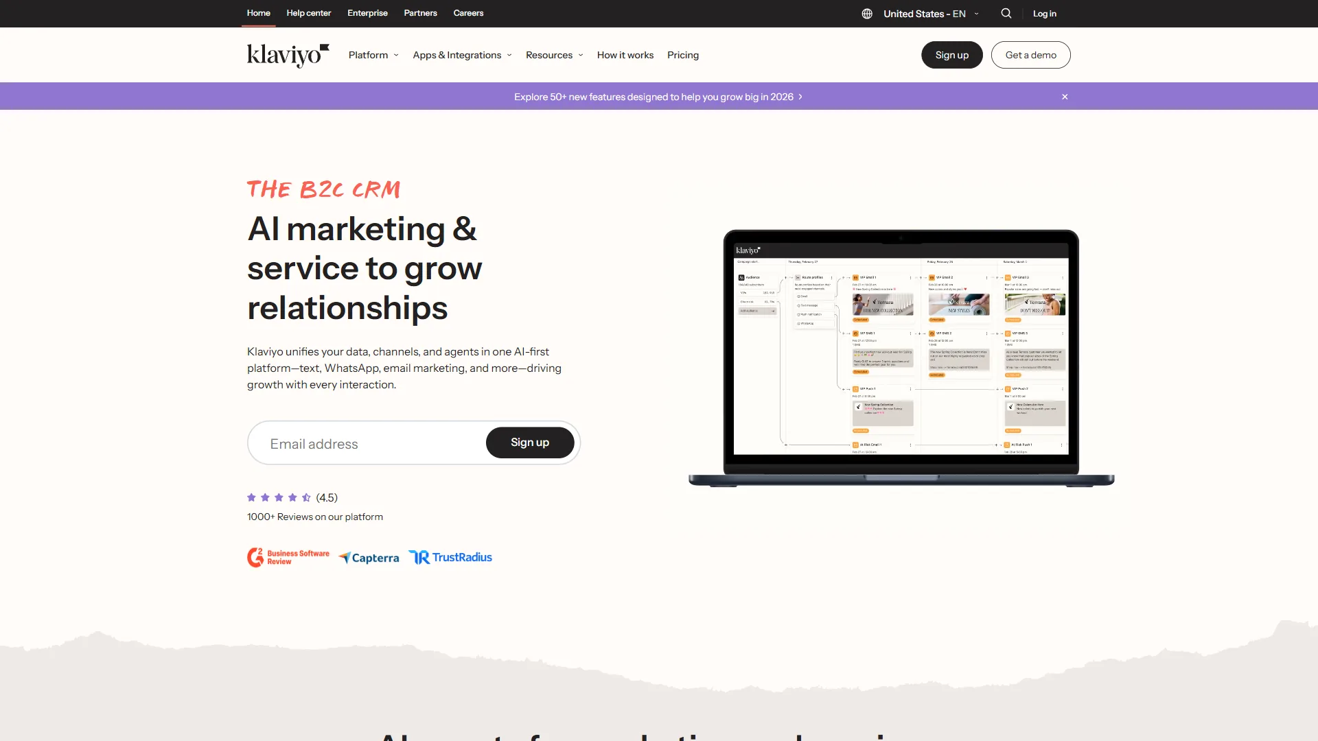 Klaviyo homepage with The B2C CRM headline, AI marketing tagline, and laptop showing the platform dashboard